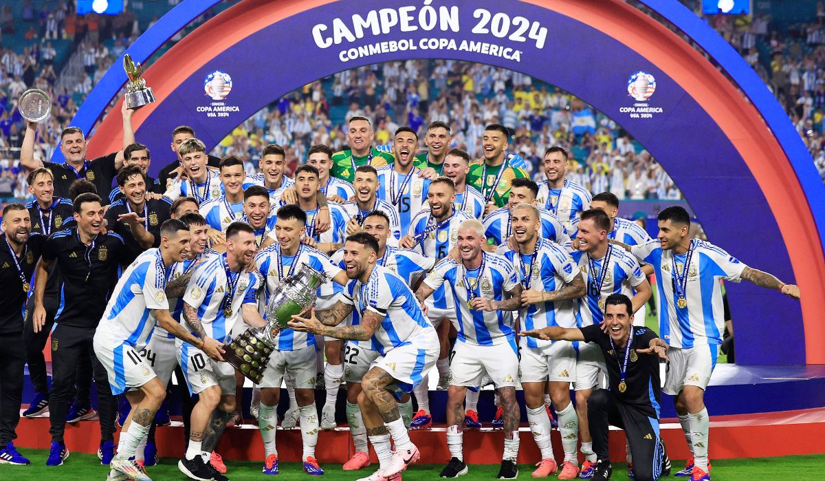 Lionel Messi lifts the trophy